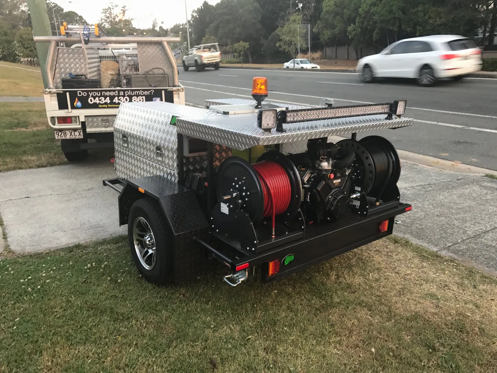 Shoreside Plumbing drain jetter trailer on a job