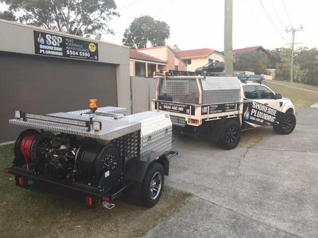 Shoreside Plumbing crew outside the workshop